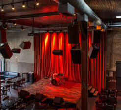 Icehouse Minneapolis stage area with band setup modern, yet rustic