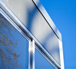 Close-up detail of the aluminum siding on the exterior of the renovated home