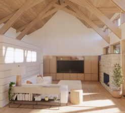 The main living space in the Prairie Place residence (unbuilt) with a high vaulted ceiling accented by light wood beams. A white shiplap covered wall partition separates the living space from the hallway on the left, and large sliding doors to the deck line the wall on the right. A creamy white couch sits in the center of the room.